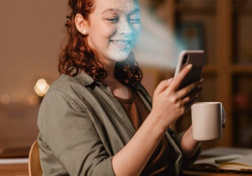 woman-with-phone-doing-face-scan (1)
